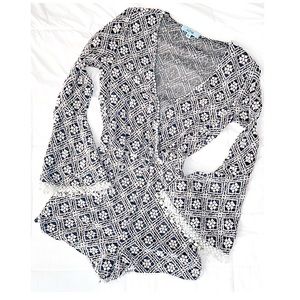 Low V-Neck black and white lace romper